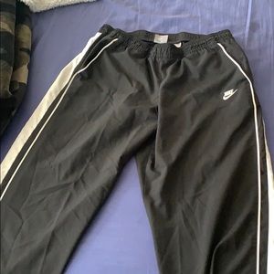 Nike swoosh loose fitting ankle pants w/ pockets